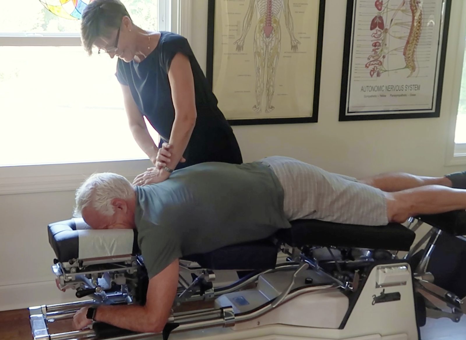 Dr. Lamarche performing a chiropractic adjustment
