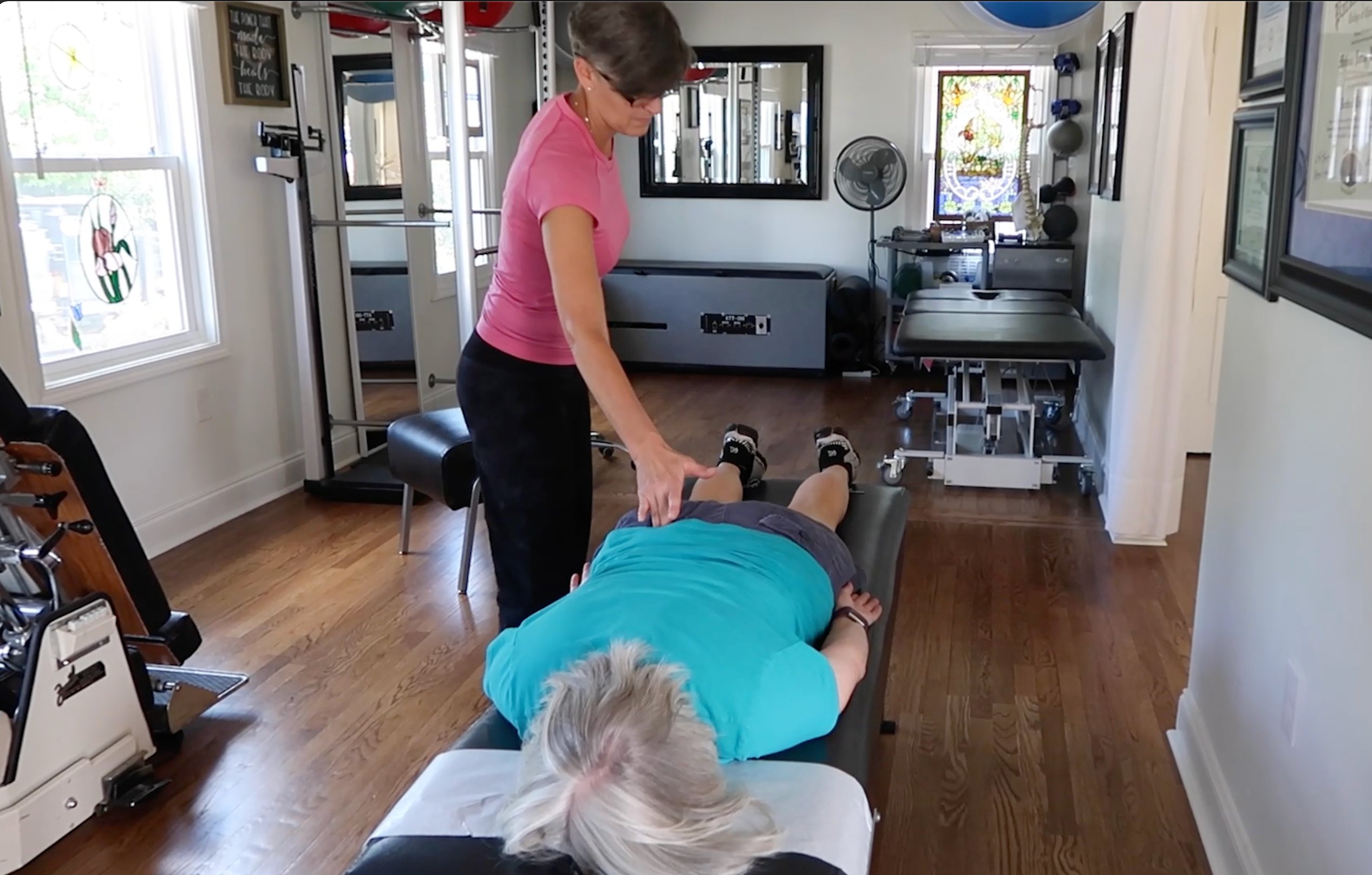 Dr. Lamarche performing chiropractic adjustment